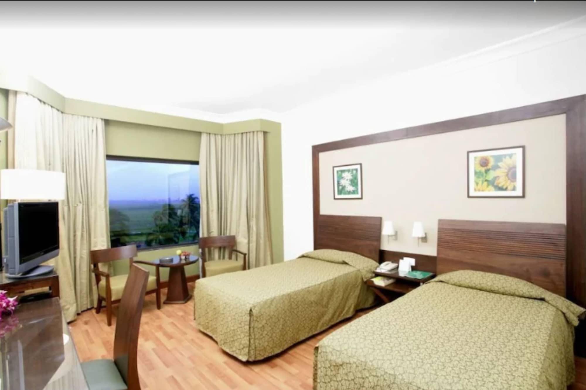 The Retreat Hotel & Convention Centre Mumbai Szoba fotó